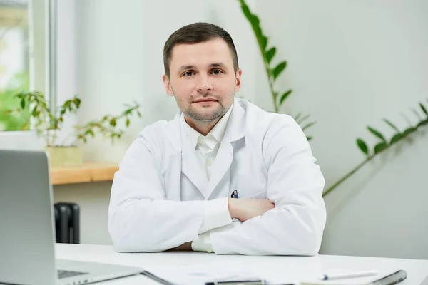 Kind Caucasian Doctor White Lab Coat Sitting Arms Crossed Listening — Stock Photo, Image