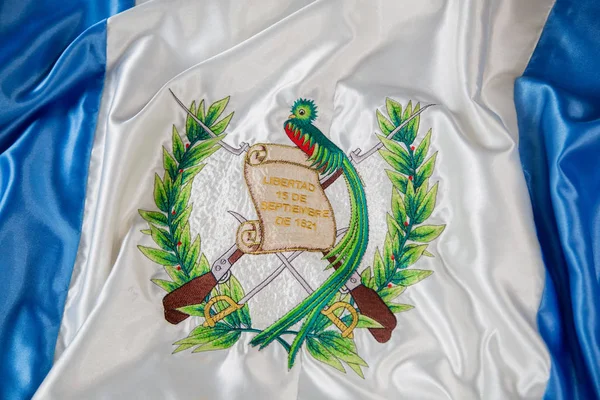 Fechar o escudo nacional da Guatemala - Bandeira nacional da Guatemala — Fotografia de Stock