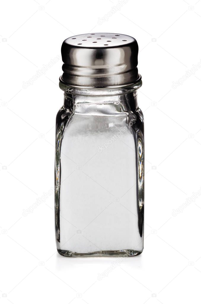 A glass shaker of table salt isolated on white background with clipping path