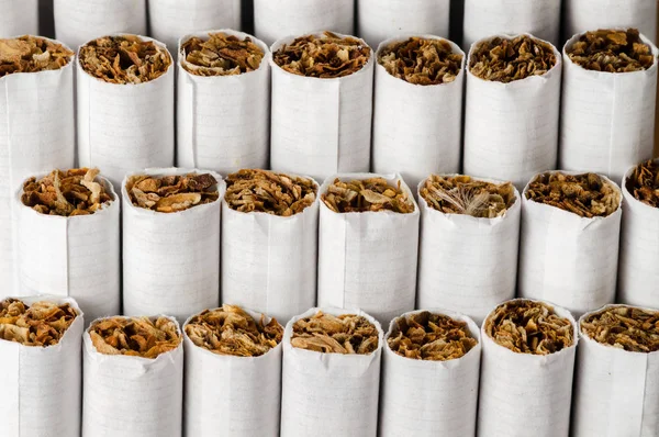 Background of cigarettes arranged in steps and side by side