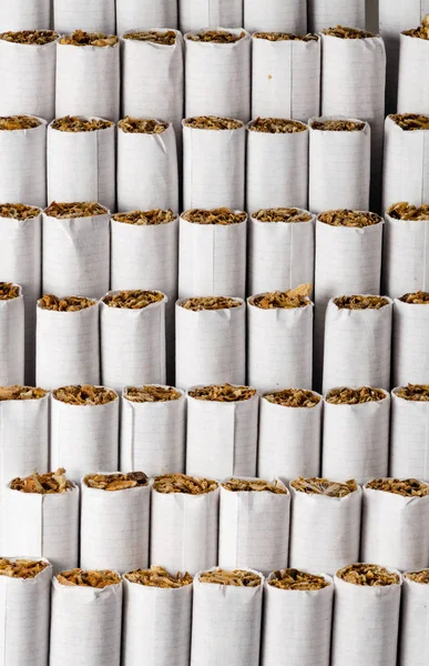 Background of cigarettes arranged in steps and side by side - portrait orientation