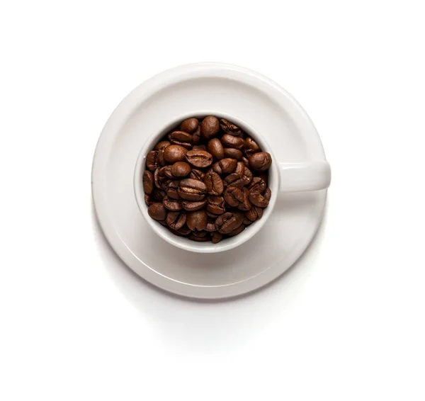 Top View Photo of a Coffee cup filled with coffee beans and sauc — Stock Photo, Image