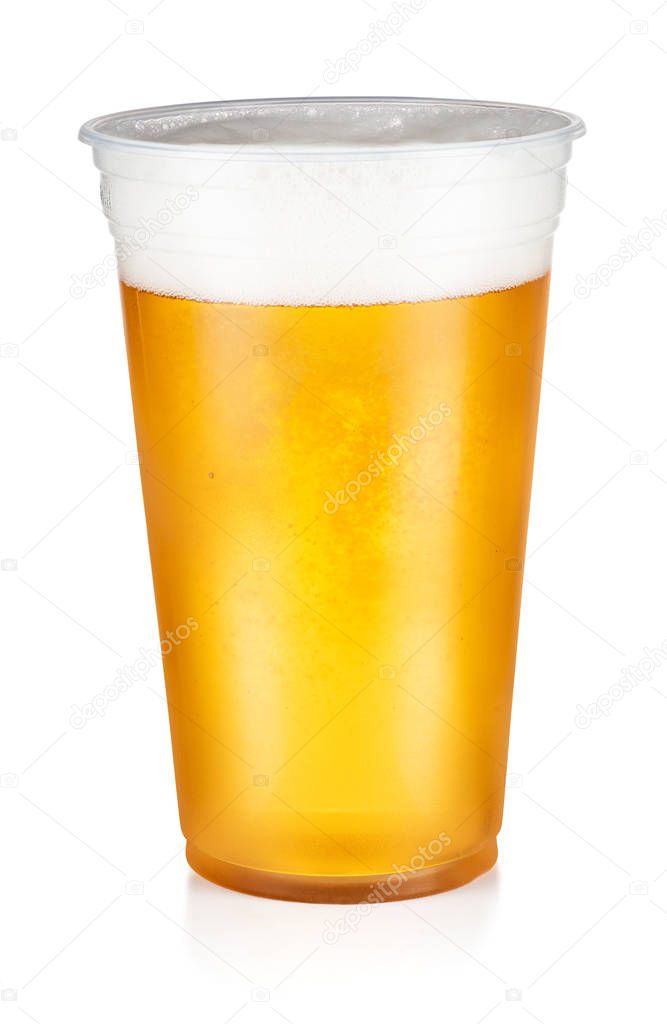 Beer, ale or lager in a plastic disposable cup isolated on white