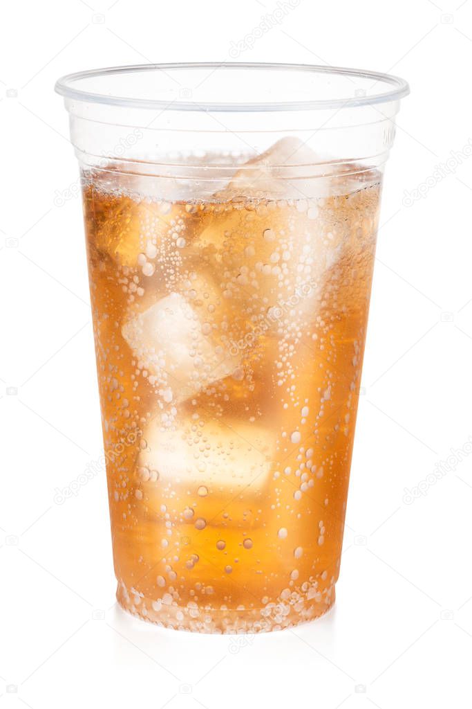 Guarana carbonated drink with ice in a plastic cup isolated on w