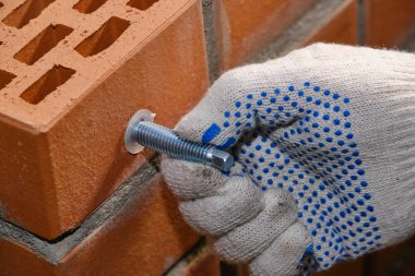 Kırmızı içi boş tuğla. Tuğla. Kimyasal çapa u yükleme