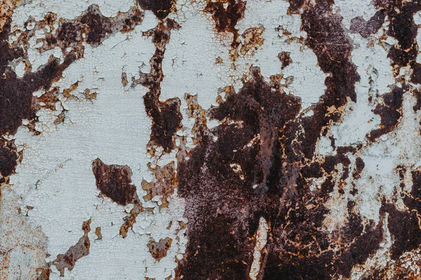 锈迹斑斑的旧金属的纹理。背景从肮脏的铁屑腐蚀 — 图库照片
