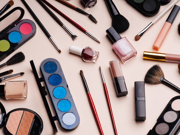 Professional makeup, face care and beauty set for women. Brushes, eye shadow, lipstick, powder, nail Polish