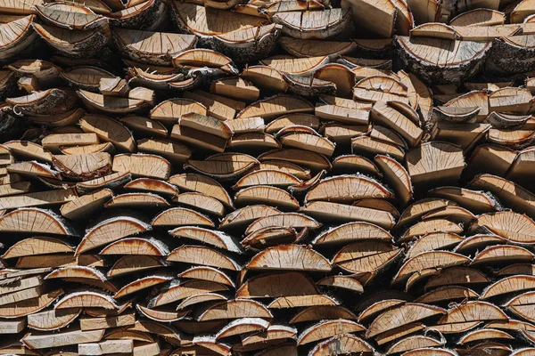 birch wood piled in a woodpile