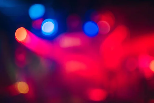 Colorful background with bokeh defocused blurred multicolored lights — Stock Photo, Image