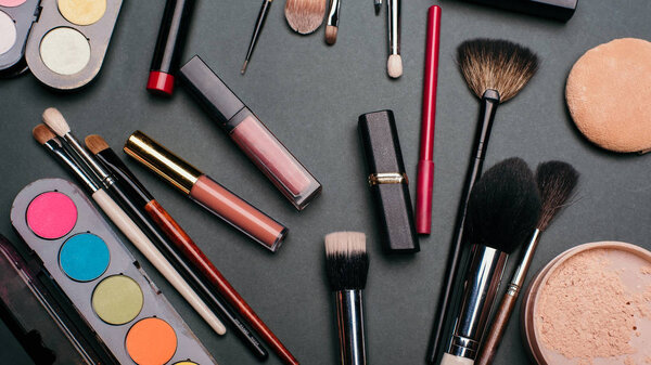 professional makeup and facial beauty kit. Brushes, lipstick, eye shadow