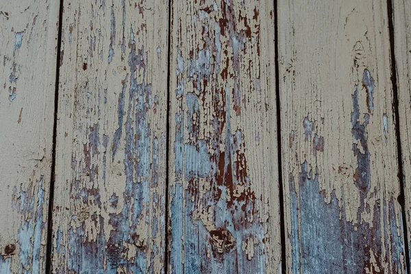 ひび割れた古い塗料を持つ木製の板の質感 — ストック写真