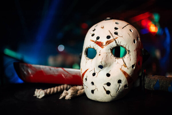 Jacks mask with a bloody sword on Halloween