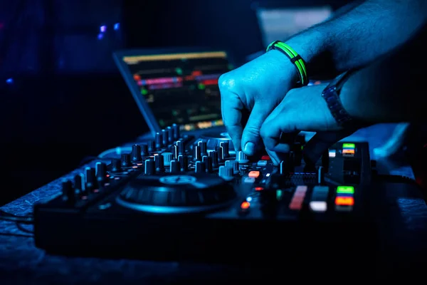Hand DJ mixing electronic music on a professional controller — Stock Photo, Image