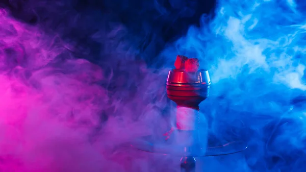 Hookah red hot coals for shisha in a bowl against a background of smoke — Stock Photo, Image