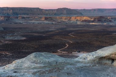 Flat Arid Landscape with Distant Caravan from Stud Horse Point, Page, Arizona, USA. High quality photo