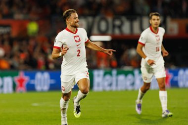 Matty Cash, Hollanda ve Polonya milli takımları arasında oynanan Dünya Kupası 2026 Avrupa ön eleme maçında gol attıktan sonra kutlama yaparken görüldü (Maciej Rogowski / Ball Raw Images)