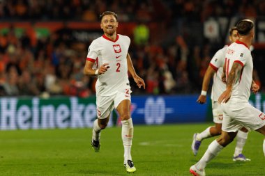 Matty Cash, Hollanda ve Polonya milli takımları arasında oynanan Dünya Kupası 2026 Avrupa ön eleme maçında gol attıktan sonra kutlama yaparken görüldü (Maciej Rogowski / Ball Raw Images)