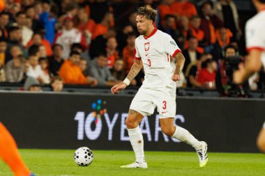 Przemyslaw Wisniewski, Hollanda ve Polonya milli takımları arasında oynanan Dünya Kupası 2026 Avrupa ön eleme maçında görüldü (Maciej Rogowski / Ball Raw Images)