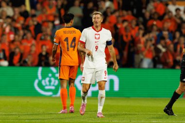 Tijjani Reijnders ve Robert Lewandowski, Hollanda ve Polonya milli takımları arasında oynanan 2026 Dünya Kupası ön eleme maçında görüldü (Maciej Rogowski / Ball Raw Images)