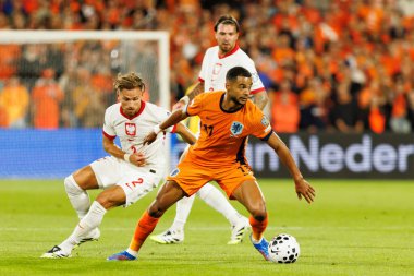 Nicola Zalewski ve Cody Gakpo, Hollanda ve Polonya milli takımları arasında oynanan 2026 Dünya Kupası ön eleme maçında görüldü (Maciej Rogowski / Ball Raw Images)