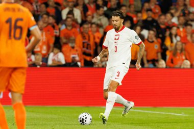 Przemyslaw Wisniewski, Hollanda ve Polonya milli takımları arasında oynanan Dünya Kupası 2026 Avrupa ön eleme maçında görüldü (Maciej Rogowski / Ball Raw Images)