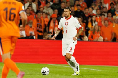 Przemyslaw Wisniewski, Hollanda ve Polonya milli takımları arasında oynanan Dünya Kupası 2026 Avrupa ön eleme maçında görüldü (Maciej Rogowski / Ball Raw Images)