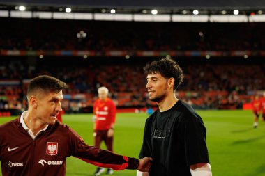 Krzysztof Piatek ve Jakub Moder, Hollanda ve Polonya milli takımları arasında oynanan Dünya Kupası 2026 Avrupa ön eleme maçında görüldü (Maciej Rogowski / Ball Raw Images)