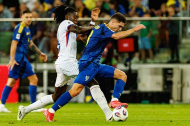 Manu Kone ve Georgiy Sudakov, Ukrayna ve Fransa milli takımları arasında oynanan Dünya Kupası 2026 Avrupa ön eleme maçında görüldü (Maciej Rogowski / Ball Raw Images)