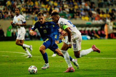 Yehor Yarmolyuk ve Kylian Mbappe, Ukrayna ve Fransa milli takımları arasında oynanan 2026 Dünya Kupası ön eleme maçında görüldü (Maciej Rogowski / Ball Raw Images)