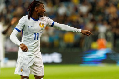 Ukrayna ve Fransa milli takımları (Maciej Rogowski / Ball Raw Images) arasındaki Dünya Kupası 2026 Avrupa ön eleme maçında Michael Olise izledi)