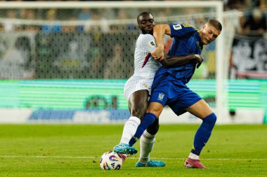 Artem Dovbyk ve Dayot Upamecano, Ukrayna ve Fransa milli takımları arasında oynanan 2026 Dünya Kupası ön eleme maçında görüldü (Maciej Rogowski / Ball Raw Images)