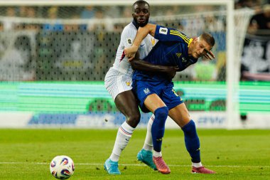 Artem Dovbyk ve Dayot Upamecano, Ukrayna ve Fransa milli takımları arasında oynanan 2026 Dünya Kupası ön eleme maçında görüldü (Maciej Rogowski / Ball Raw Images)