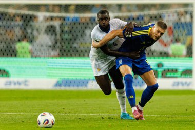 Artem Dovbyk ve Dayot Upamecano, Ukrayna ve Fransa milli takımları arasında oynanan 2026 Dünya Kupası ön eleme maçında görüldü (Maciej Rogowski / Ball Raw Images)