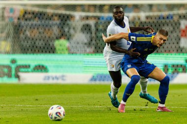 Artem Dovbyk ve Dayot Upamecano, Ukrayna ve Fransa milli takımları arasında oynanan 2026 Dünya Kupası ön eleme maçında görüldü (Maciej Rogowski / Ball Raw Images)