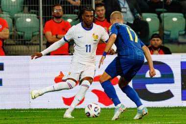 Ukrayna ve Fransa milli takımları (Maciej Rogowski / Ball Raw Images) arasındaki Dünya Kupası 2026 Avrupa ön eleme maçında Michael Olise izledi)