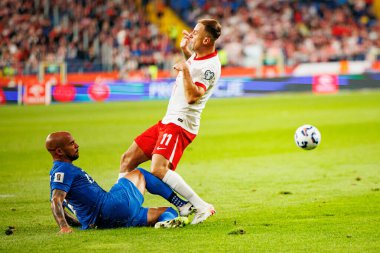 Nikolai Alho ve Kamil Grosicki, Polonya ve Finlandiya milli takımları arasında oynanan 2026 Dünya Kupası ön eleme maçında görüldü (Maciej Rogowski / Ball Raw Images)