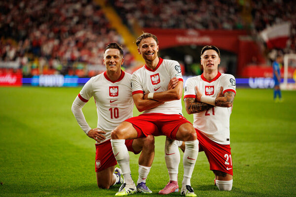 Piotr Zielinski, Matty Cash and Nicola Zalewski seen celebrating after scoring goal  during World Cup 2026 European qualification game between national teams of Poland and Finland (Maciej Rogowski/ Ball Raw Images)