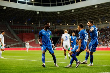 Eli Dasa, Dan Biton ve Oscar Gloukh, İsrail ve İtalya milli takımları arasındaki Dünya Kupası 2026 Avrupa ön eleme maçında gol attıktan sonra kutlama yaparken görüldü (Maciej Rogowski / Ball Raw Images)