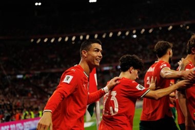 Players of Portugal seen celebrating after goal from Joao Cancelo  during World Cup 2026 European qualification game between national teams of Hungary and Poland (Maciej Rogowski/ Ball Raw Images)