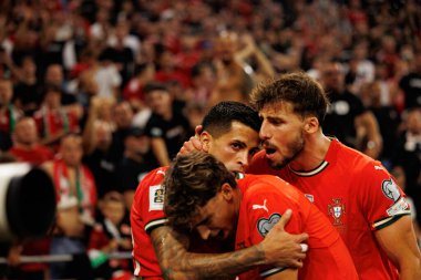 Joao Cancelo, Joao Felix and Ruben Dias  seen celebrating after scoring goal during World Cup 2026 European qualification game between national teams of Hungary and Poland (Maciej Rogowski/ Ball Raw Images)