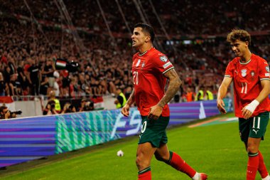 Joao Cancelo and Joao Felix seen celebrating after scoring goal during World Cup 2026 European qualification game between national teams of Hungary and Poland (Maciej Rogowski/ Ball Raw Images)