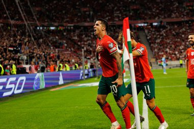 Joao Cancelo and Joao Felix seen celebrating after scoring goal during World Cup 2026 European qualification game between national teams of Hungary and Poland (Maciej Rogowski/ Ball Raw Images)