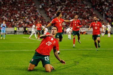 Joao Cancelo seen celebrating after scoring goal during World Cup 2026 European qualification game between national teams of Hungary and Poland (Maciej Rogowski/ Ball Raw Images)