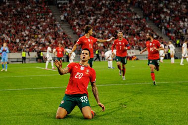 Joao Cancelo seen celebrating after scoring goal during World Cup 2026 European qualification game between national teams of Hungary and Poland (Maciej Rogowski/ Ball Raw Images)
