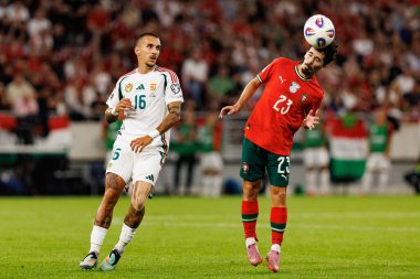 Daniel Lukacs and Vitinha seen  during World Cup 2026 European qualification game between national teams of Hungary and Poland (Maciej Rogowski/ Ball Raw Images)