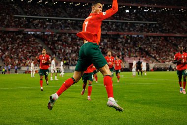 Cristiano Ronaldo seen celebrating after scoring goal  during World Cup 2026 European qualification game between national teams of Hungary and Poland (Maciej Rogowski/ Ball Raw Images)