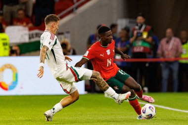 Bendeguz Bolla and Nuno Mendes seen  during World Cup 2026 European qualification game between national teams of Hungary and Poland (Maciej Rogowski/ Ball Raw Images)