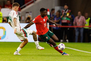 Bendeguz Bolla and Nuno Mendes seen  during World Cup 2026 European qualification game between national teams of Hungary and Poland (Maciej Rogowski/ Ball Raw Images)