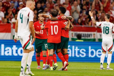 Players of Portugal seen  celebrating after goal from Bernardo Silva during World Cup 2026 European qualification game between national teams of Hungary and Poland (Maciej Rogowski/ Ball Raw Images)