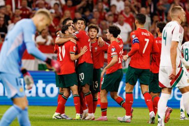 Players of Portugal seen  celebrating after goal from Bernardo Silva during World Cup 2026 European qualification game between national teams of Hungary and Poland (Maciej Rogowski/ Ball Raw Images)